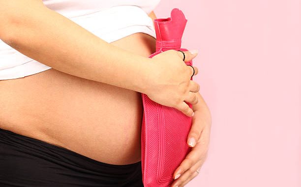 Est-il bon de mettre sur le ventre une bouillotte enceinte ?